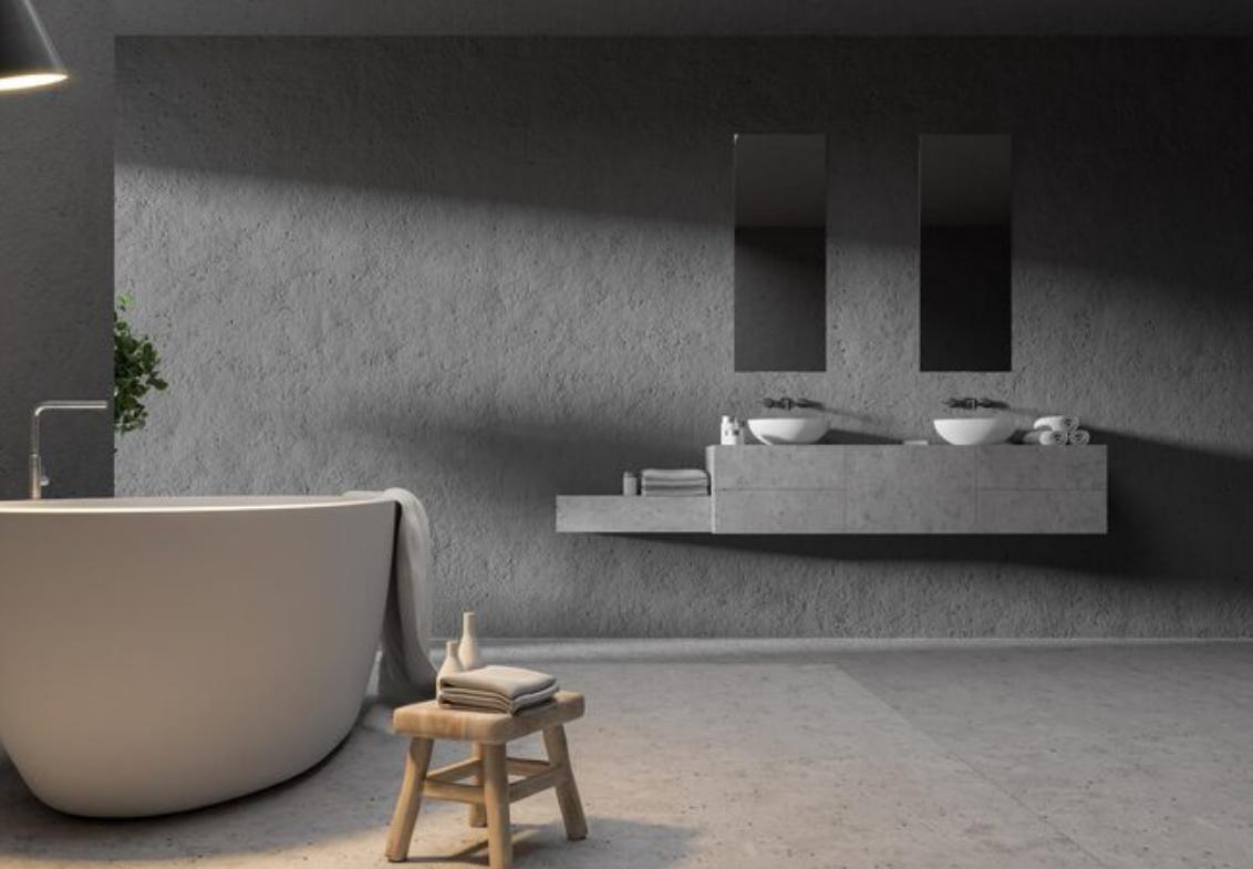 Comment adopter le béton ciré sur les murs de sa salle de bain