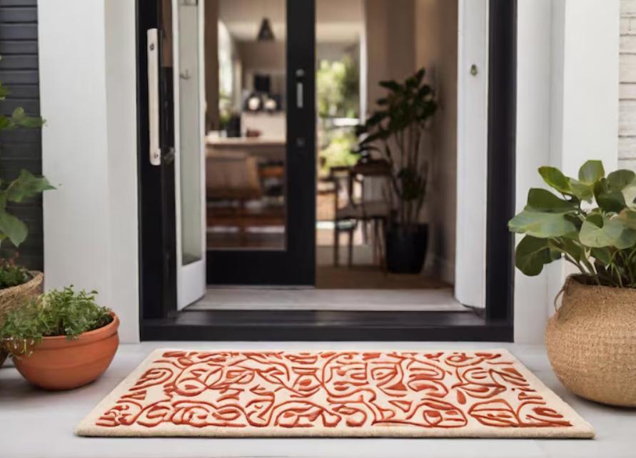 Protéger un sol à fort passage avec un tapis d’entrée