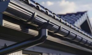 Zinguerie et gouttières : fixer la descente d’eau pluviale