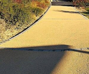 Allées carrossables drainantes en enrobé : exigences de perméabilisation des sols